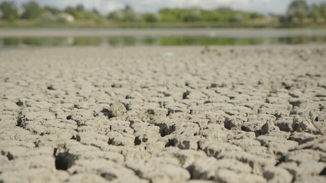 Dolly shot. Lake Bed Dries Up and Cracks During an Extreme Drought	
