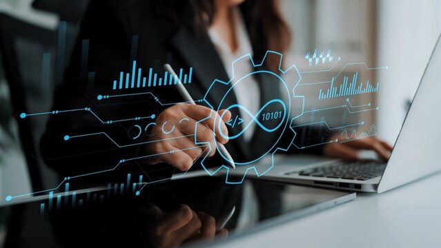 Female professional using digital tools to analyze data on a laptop with futuristic interface elements showcasing technology and innovation concepts. Entropy.