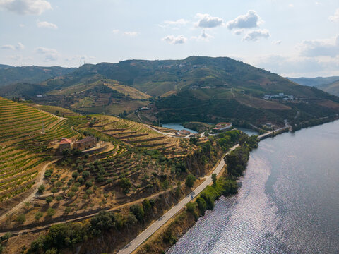 Douro river flowing past terraced vineyards, tabua&ccedil;o, portugal