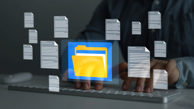 Document management system with file folders and archive storage. Digital organization helps manage records, data and business information.