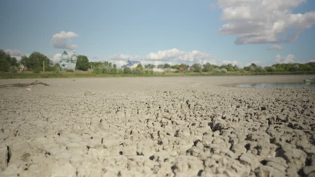 Dolly shot. Lake Bed Dries Up and Cracks During an Extreme Drought