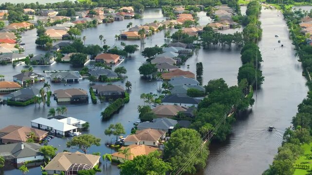 Flooded residential area with underwater houses from hurricane Debby rainfall water in Laurel Meadows community in Sarasota, Florida. Aftermath of natural disaster in southern USA