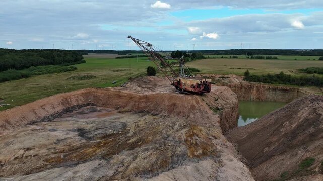 Menciai, Lithuania - August 27, 2026. Dragline excavator in limestone quarry