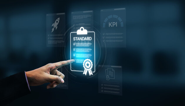 A business professional points at a digital standard document showcasing key performance indicators, symbolizing success and strategy in a modern office environment. Nascent