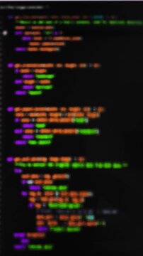 Blurred text flow of color Python programming code script lines loop. Soft focus monitor screen layout with colorful digital tech data stream overlay. Defocused neon development mainframe