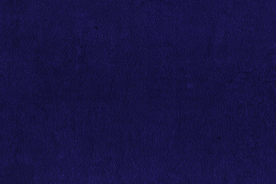 Dark indigo blue texture with a soft, fine and slightly grainy surface, ideal as an abstract background for graphic design, decor and creative projects.