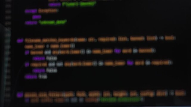 Blurred technology monitor canvas with fast compiling stream of computer script lines. Defocused application code programming interface layout. Soft focus digital engineering backdrop for