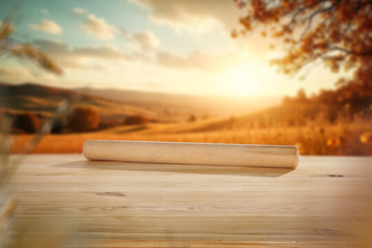 Autumn landscape with wooden table and copy space &ndash; warm seasonal concept