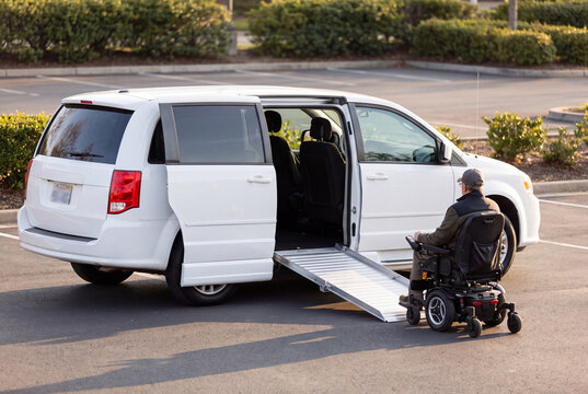 Accessible van with a wheelchair ramp deployed