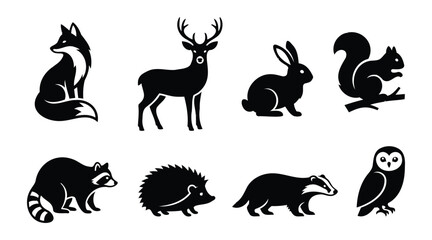 Obraz premium Set of black silhouette of forest animals including a fox, deer, rabbit, squirrel, raccoon, hedgehog, badger, and owl on white background