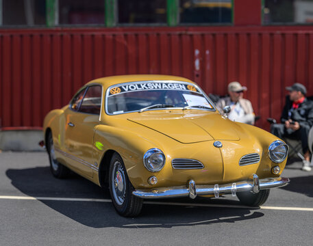 Gothenburg, Sweden - May 30 2026: Yellow Volkswagen Karmann Ghia coupe displayed at classic car show.
