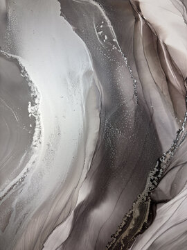 Handmade original alcohol ink abstract macro. Silver metallic fluid texture, swirling patterns, shimmer particles, glossy bubbles. Royalty free artwork, no AI.