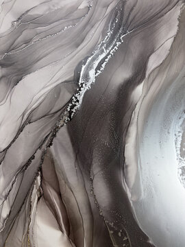 Handmade original alcohol ink abstract macro. Silver metallic fluid texture, swirling patterns, shimmer particles, glossy bubbles. Royalty free artwork, no AI.