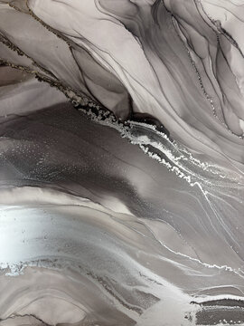 Handmade original alcohol ink abstract macro. Silver metallic fluid texture, swirling patterns, shimmer particles, glossy bubbles. Royalty free artwork, no AI.
