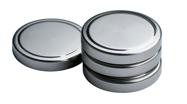 Isolated stack of shiny metallic round button batteries and a single one nearby
