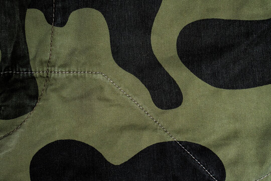 Military Camo Textile Background With Seam
