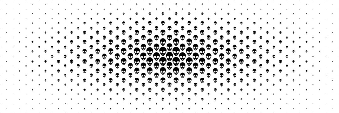 horizontal halftone of black alien heads spread from center for pattern and background.