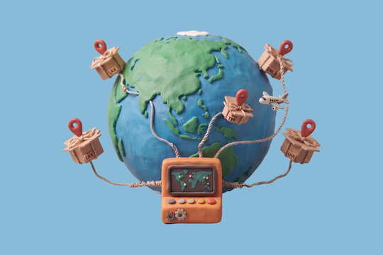 Conceptual clay model illustrating global logistics network with Earth, packages, and tracking console on a light blue background.