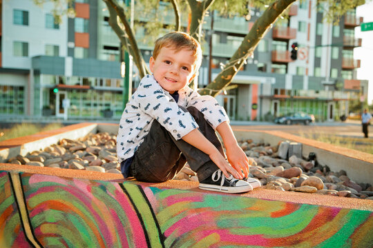 Little Boy in Urban Setting