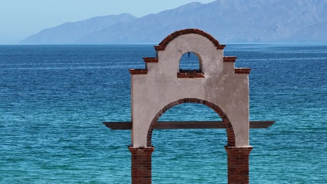 Aerial view rising over beach arch in Punta Arena, La Ventana, Sea of Cortez.