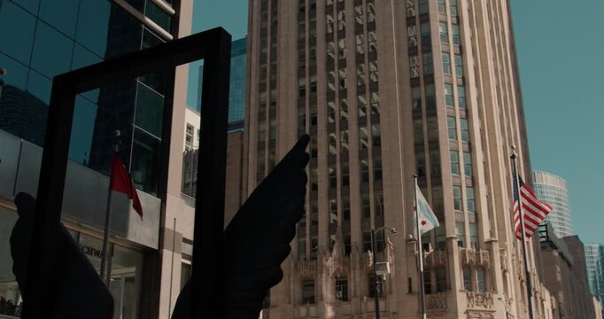Chicago tribune tower with american flag waving