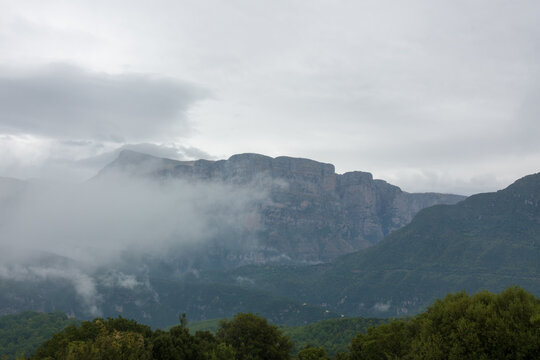 Amazing view to the Tymfi mountain over Papiggo village, Pindos, Greece