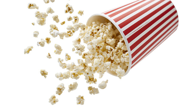 Isolated fresh popcorn flying out of a classic striped container, movie theater snack