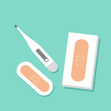 Thermometer and a box of adhesive bandages, clean flat medical style