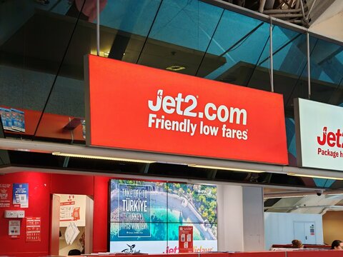 Newcastle upon Tyne,United Kingdom-12 February 2025:JET2 AND JET2HOLIDAYS sales desks at Newcastle International Airport, airport concession