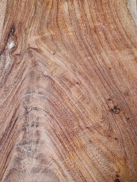 Natural warm wooden texture background with organic grain patterns for rustic interior design and furniture