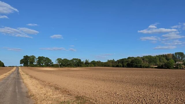 Inkpen Berkshire England UK. 28..08.2026. Video. Farmland having been ploughed after an early harvest during a hot summer season.