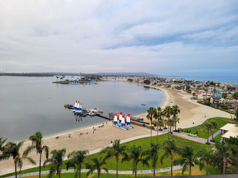 Early morning at Sail Bay with a distant view of  San Diego cityscape under a cloudy summer sky, Southern California