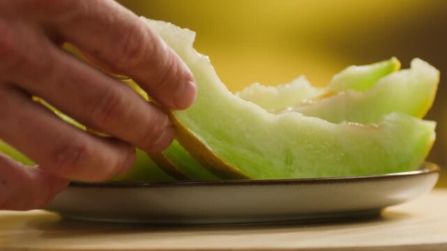 Melon close up, man cutting Watercolor of a whole melon and slice, summer juicy fruit
