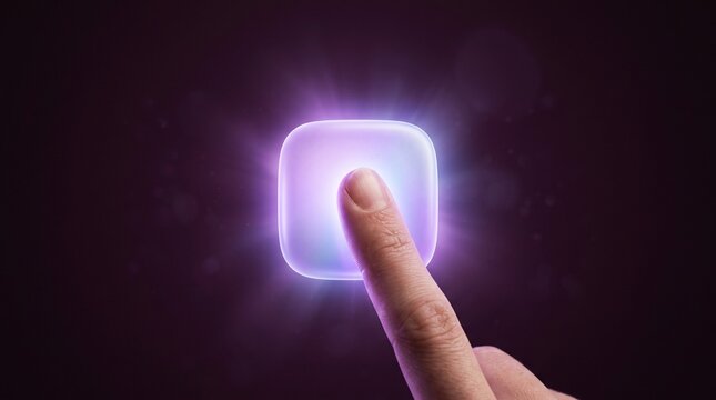 Fingertip presses illuminated square button against a dark background
