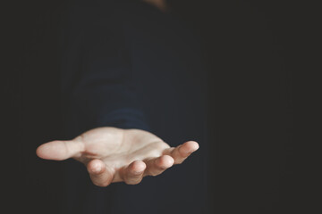 Closeup male hand open palm for giving helping asking image concept.