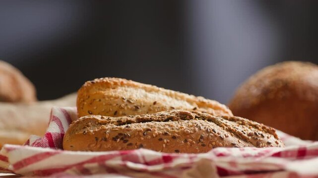 Baguette Bread torn apart by hand, fresh baguette crumb close-up macro shot showing soft airy texture