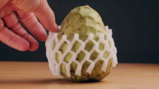Tropical fruit cherimoya, ice cream fruit or custard apple on market in Spain