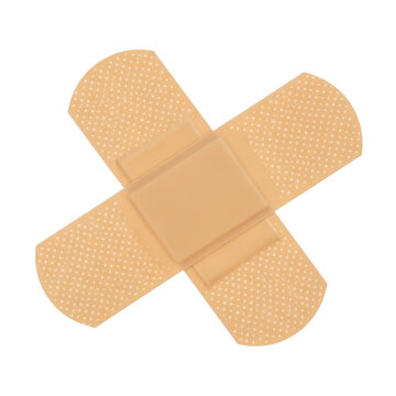 Beige adhesive bandage cross shape on skin for first aid