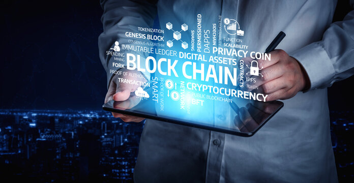 A person interacts with a digital tablet showcasing various concepts related to blockchain technology and cryptocurrency, set against an urban backdrop. Tessel