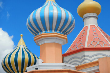 Colorful Onion Domes Against a Clear Blue Sky © IchmunandarSt