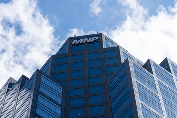 Obraz premium Toronto, Ontario, Canada - September 7, 2026: MNP office building on Adelaide Street East in downtown Toronto, Ontario, Canada. MNP is a Canadian professional accountancy and business advisory firm. 