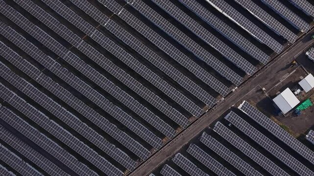 Aerial View of a Large Solar Panel Farm.