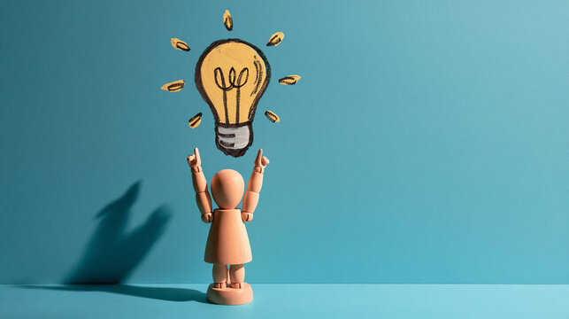 A Bright Idea Emerges: A stylized wooden figure reaches upwards towards a glowing lightbulb, symbolizing the spark of creativity and the birth of a new concept.