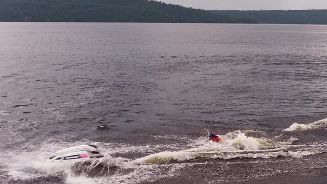 Stand up jet ski on a calm summer lake in the north on fresh water