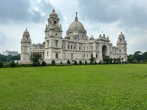 Victoria Memorial historical monument facade with green lawns in Kolkata.