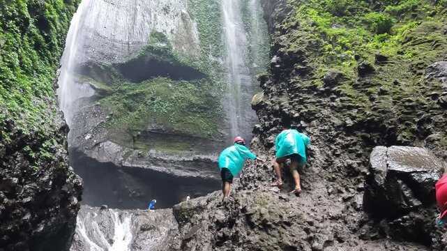 Footage of unknown tourist while climbing to last chamber of Madakaripura waterfalls the tallest waterfalls in Java island and second tallest waterfalls in Indonesia.