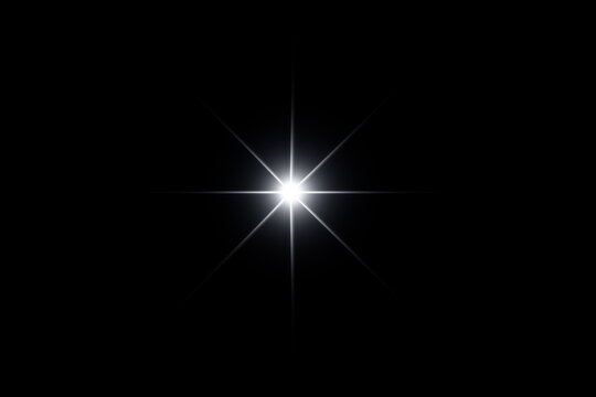 A brilliant white starburst shining in a dark background.