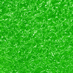 Fototapeta premium Green lime foil shiny texture, abstract wrapping paper for background and design art work.