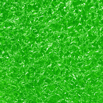 Green lime foil shiny texture, abstract wrapping paper for background and design art work.