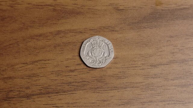 Twenty Pence British Pound Coin. Close up of UK, United Kingdom, currency. Back side of the Twenty Pence UK pound Coin